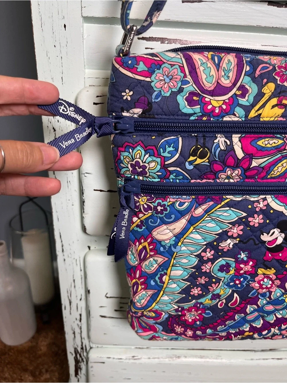 Vera Bradley Disney Collab Triple Zip Hipster in sensational six pattern.